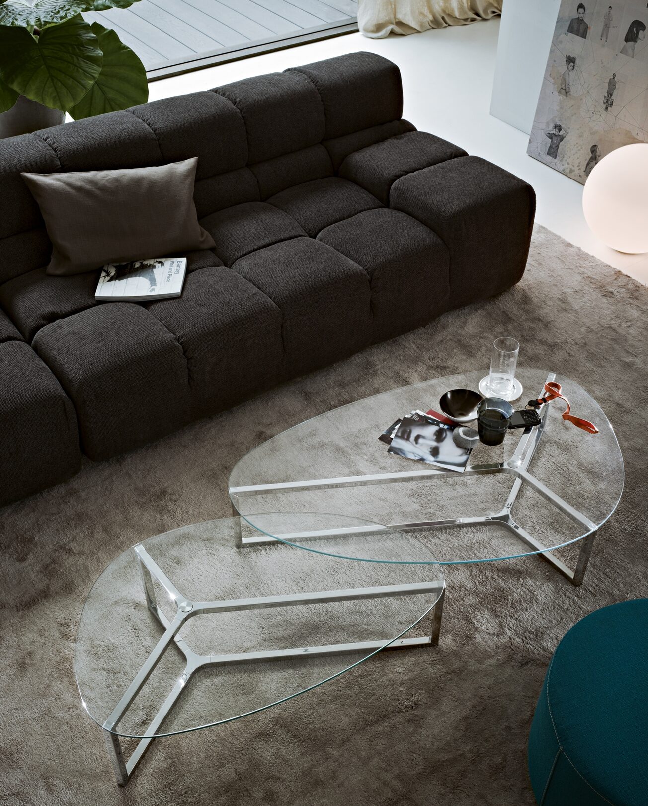 Raj 3 coffee table with a bright stainless steel base